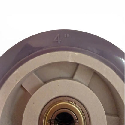 Lila 4-Zoll-Industrierad mit beigem Kunststoffnabe und Messinglager